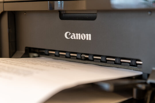 London. UK- 12.07.2022. Close up of a Canon inkjet printer with the company name, trademark on the product.