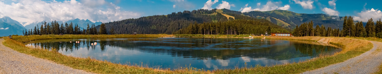 High resolution stitched panorama with reflections at the famous Schmittenhoehe summit, Zell am...
