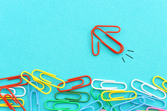 Concept image of unique thinking. Paper clips in the shape of airplane. Idea of teamwork and leadership