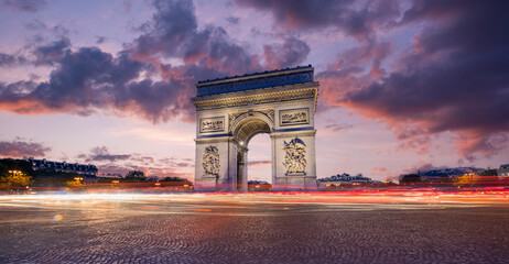 Fototapeta na wymiar Arc de Triomphe(Arch of Triumph) Paris city at sunset. Long exposure panorama