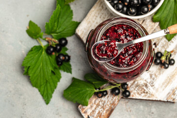 Delicious black currant jam urd, custard or jam and fresh berries, banner, menu, recipe place for text, top view
