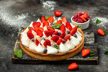 Homemade tart pie or cake with whipped cream and fresh raspberry. Food recipe background. Close up - obrazy, fototapety, plakaty