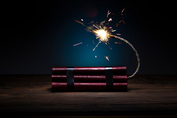 Dynamite sticks on a wooden floor.