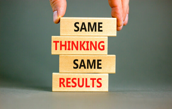 Same thinking and results symbol. Concept word Same thinking same results on wooden blocks. Beautiful grey table grey background. Business and same thinking and results concept. Copy space.