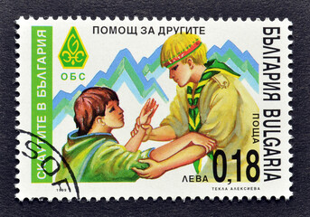 Cancelled postage stamp printed by Bulgaria, that shows Scouts, circa 1999.