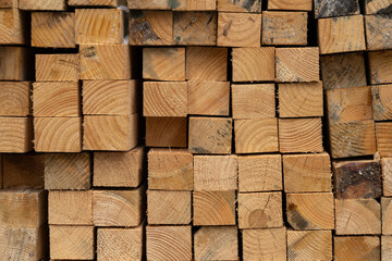Close up photo of stack wood beams