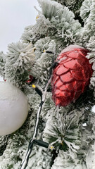 red cone christmas tree toy for christmas in the snow