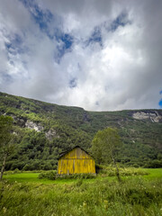 old yellow house in the mountains