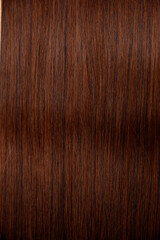Naklejka premium Perfect natural brown hair close up.Brown hair. Textures, background