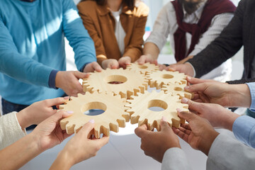 Team of people connecting gear wheels. Group of men and women joining cog wheels. Business, teamwork, effective work, project management, innovation, integration concepts - obrazy, fototapety, plakaty