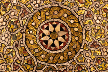 Islamic medieval arts in historic buildings. Ancient mosaic ornaments of mosque of Abraham in...