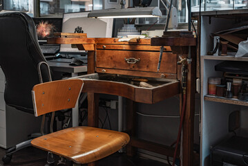 Wooden work table and jeweler's tools