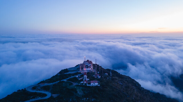 4k aerial views with drone. Monastery of Monte Toro, in the centre of the island of Menorca, Balearic Islands.