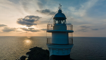 Fototapeta na wymiar Drone aerial views of the European coast, Favarix lighthouse.