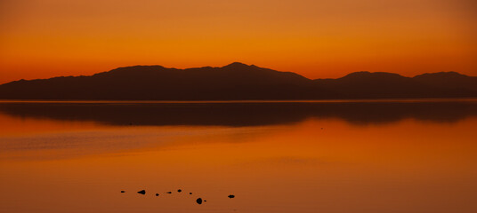 Amazing Light and reflection after sundown at the Salton Sea in California.