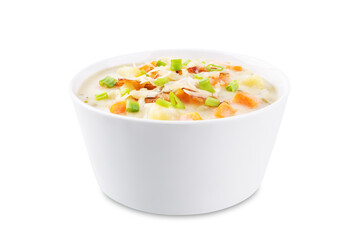 Fresh hot chowder soup with fried bacon slices and shredded cheese in a bowl on a white isolated background