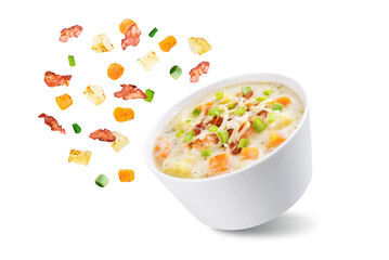 Fresh hot chowder soup with fried bacon slices and shredded cheese in a bowl on a white isolated background