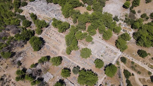 View of historical ruins, columns, ancient theater and temples in the ancient city of Priene.