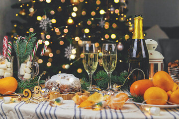 Champagne on the Christmas table. Selective focus.