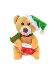 Teddy bear in a Christmas costume isolate. Selection focus.