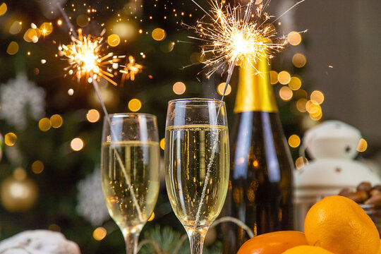 Champagne on the Christmas table. Selective focus.