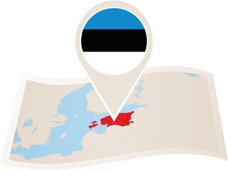 Folded paper map of Estonia with flag pin of Estonia.