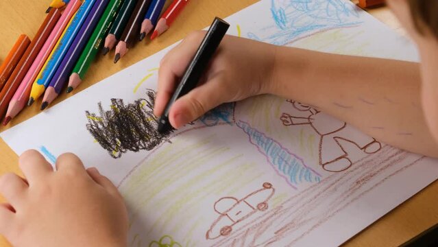 child drawing paint