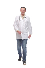 Full length portrait of young caucasian with stethoscope walking doctor