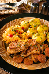 Stewed turkey meat with chorizo sausage.