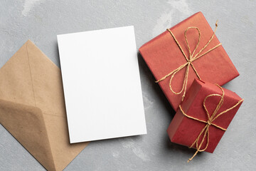 Greeting card mockup with envelope and gift boxes