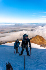 two mountaineers on the glacier of pico de orizaba