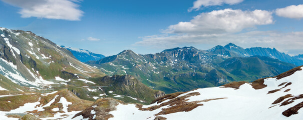 Summer (June) Alps mountain and winding road (view from Grossglockner High Alpine Road). - obrazy, fototapety, plakaty