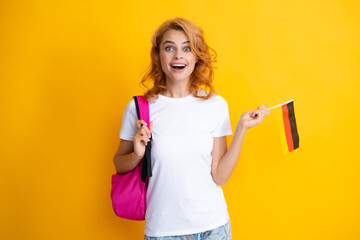 Redhed woman portrait. Education and learning in Germany, immigration and travelling in Europe. Deutschland, deutsche flag. Germany flag, study in Germany. Female student. Language learning.