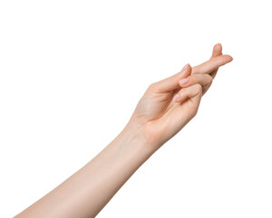 Fingers crossed on woman's hand