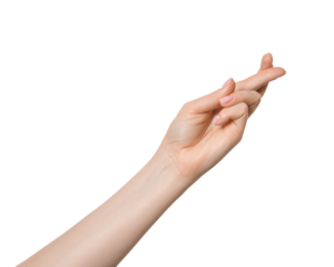 Fingers crossed on woman's hand