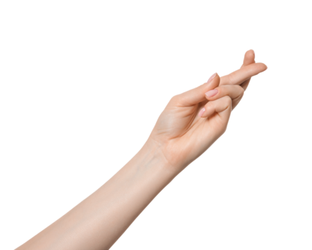 Fingers crossed on woman's hand