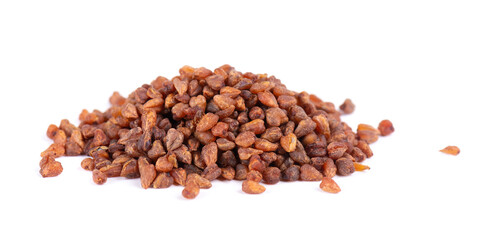 Buckwheat tea isolated on white background. Whole roasted buckwheat grains. Fagopyrum tataricum.