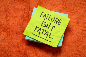 Fototapeta na wymiar failure is not fatal - inspirational reminder note, learning, experience and personal development concept