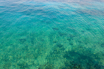 Blue water texture background. Surface of sea or ocean