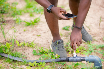 Controls the irrigation system of a tea field in a village in West Africa agribusiness.