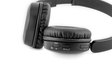 Black headphones on white background