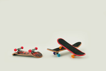 Office entertainment. Fingerboard  a skateboard on white background © Golden Shark