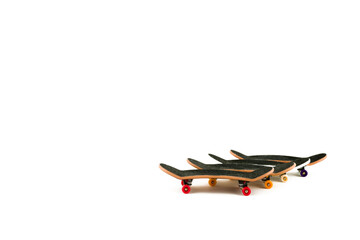 Office entertainment. Fingerboard  a skateboard on white background