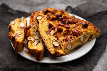 typical portuguese fruit cake Bolo rainha on plate