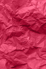 Fototapeta premium Textured paper background. Recycled paper, crumpled paper, red toned. 
