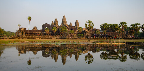 Panoramic scenery of angkor wat complex reflected on lake. Campodia Asia