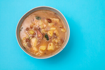 Sopa de pedra Portuguese Stone Soup with beans and sausages in the plate