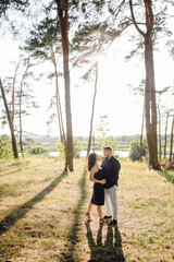 Obraz premium Young couple in love walking in the park