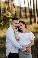 Young couple in love walking in the park