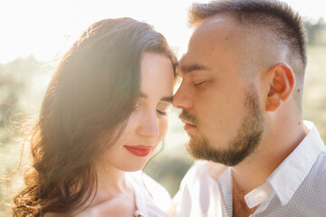 Young couple in love walking in the park